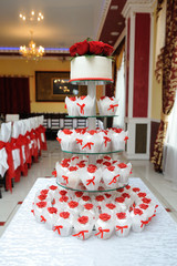 Beautiful and tasty wedding cake and cupcake