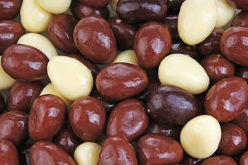 Chocolate drops eggs texture pattern background. Design wallpaper.