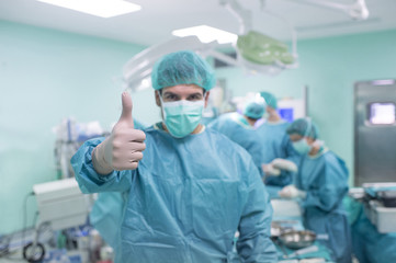 Team of Surgeons Operating in the Hospital.