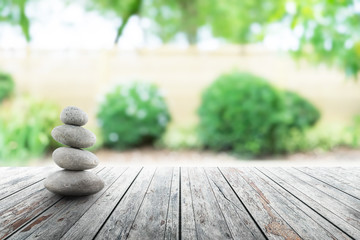 zen stones on wooden in Japanese garden spring Season. Concept relaxation,zen,spring.