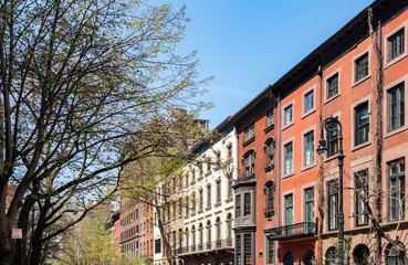 Naklejka premium Historic buildings on a street in Manhattan, New York City