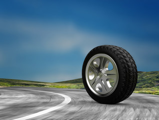 Fototapeta na wymiar one automobile wheel on the road. 3d render