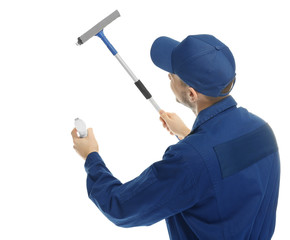 Young window cleaner on white background