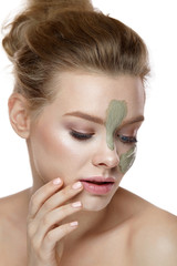 Beauty Cosmetics. Woman With Clay Mask Stripes On Facial Skin