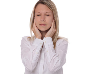 Woman covering her ears, suffering from headache because of noise isolated on white beackground