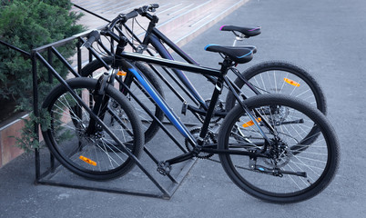 Fototapeta na wymiar Bicycles in parking lots outdoors