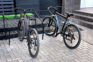 Fototapeta na wymiar Bicycles in parking lots outdoors