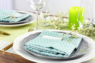 Beautiful table setting with floral decor, closeup