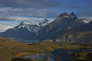 Peaks of Torres del Paine towering over the waters of  Lago Nordenskjold in Torres del Paine National Park in southern Chile