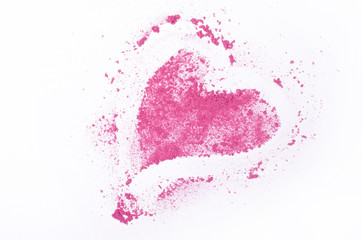 Heart shaped crushed eye shadows isolated on white background.