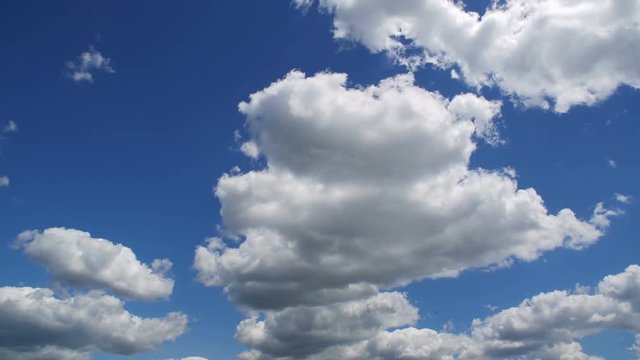 Blue sky with passing clouds time lapse
