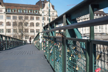 Fototapeta premium The city bridge with a lot of metal locks. Romantic and wedding traditions