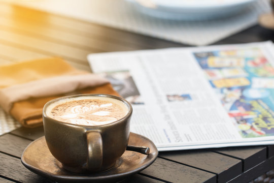 Coffee with newspaper