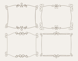 Set of four elegant calligraphic vector frames
