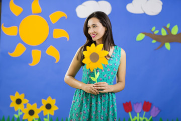 Young woman in children's theater landscape
