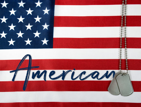 American military dog tags on United States flag background