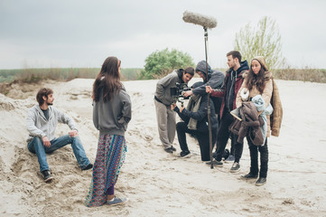 Behind the scene. Film crew filming movie scene outdoor © guruXOX