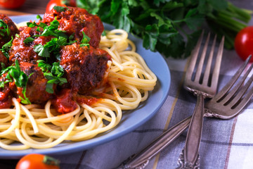 Traditional Italian spaghetti pasta with beef meatballs
