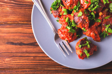 Traditional Italian beef meatballs, tomato sauce and parsley