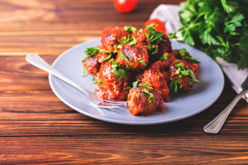 Traditional Italian beef meatballs, tomato sauce and parsley