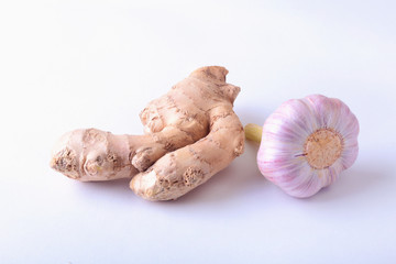 fresh ginger and garlic isolated on white background.