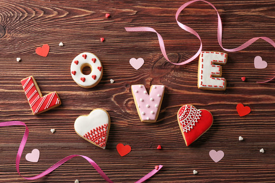 Cookies for Valentine's day on wooden background