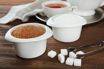 Beautiful composition with sugar on wooden background