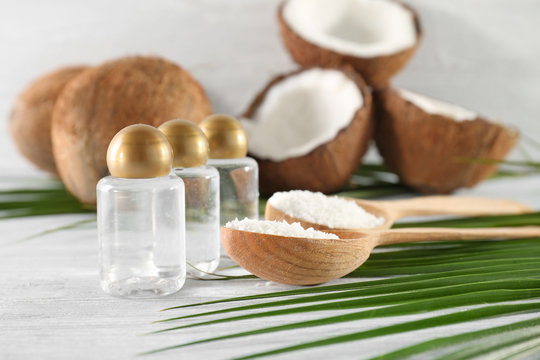 Small bottles with coconut water on table