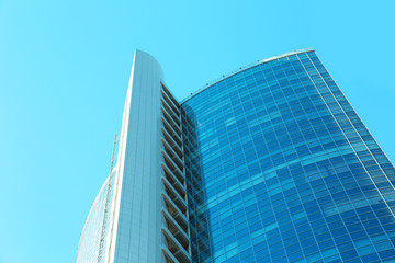 Modern office building with tinted windows, exterior view