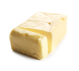 Delicious butter pieces on white background, closeup