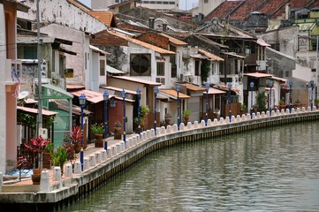 Fototapeta na wymiar Houses along the Canal in Melaka