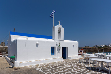 White church in town of Naoussa, Paros island, Cyclades, Greece