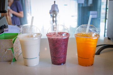 Three smoothis in cafe