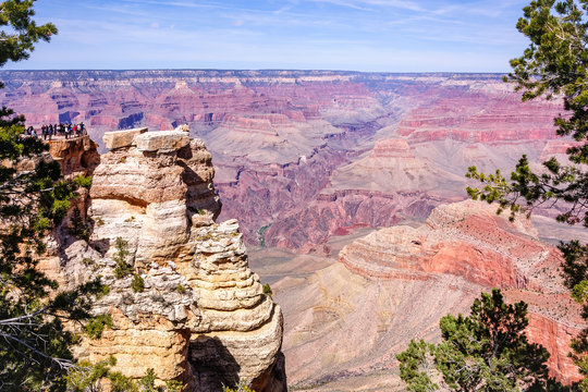 Close-up of the viewing area at Mather point where people are enjoying uninterrupted views of the majestic Grand Canyon National Park in Arizona, USA.