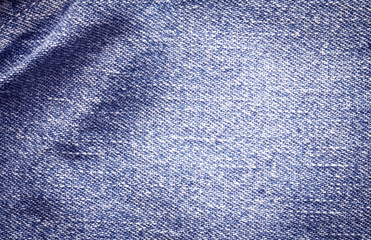 Close up  denim bright  blue jeans surface with wave texture background