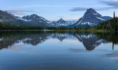 Pray Lake - A spring evening view of Pray Lake and its surrounding mountains at Two Medicine Valley region of Glacier National Park, Montana, USA.
