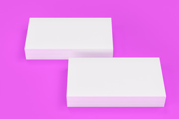 White blank business cards mock-up on violet background