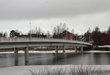 Obraz na płótnie Canvas bridge across river Oulujoki in Oulu