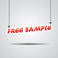 Free sample Sign Hanging On Gray Background.