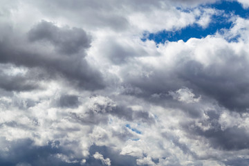A large Cumulus cloud in the blue sky.