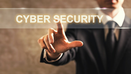 Cyber Security text with businessman