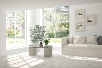 Fototapeta na wymiar White room with sofa and green landscape in window. Scandinavian interior design. 3D illustration