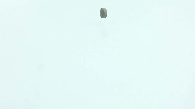 medical, vitamins, food supplement pills falling in slow motion on white background, health care diet concept