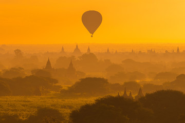 Beautiful silhouette landscape view of sunrise morning in Bagan, an ancient city located in the Mandalay Region of Myanmar.