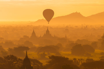 Beautiful silhouette landscape view of sunrise morning in Bagan, an ancient city located in the Mandalay Region of Myanmar.