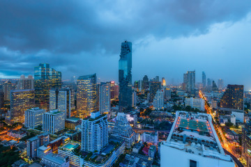Fototapeta na wymiar Aerial view of Bangkok modern office buildings, condominium in Bangkok city downtown with twilight sky , Bangkok , Thailand