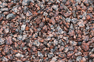 Stone texture background. Crushed granite gravel.