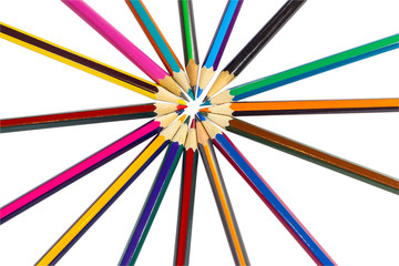 The circle is lined with colored pencils like rays of the sun