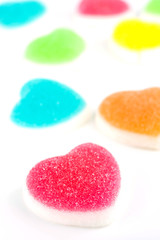 Heart candies coated with sugar, heart colorful sweet candies, sugar heart shaped candy
