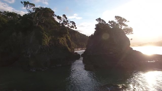 Aerial flight through rocks at Whale Bay on the Tutukaka coast, New Zealand